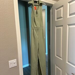 green jumpsuit